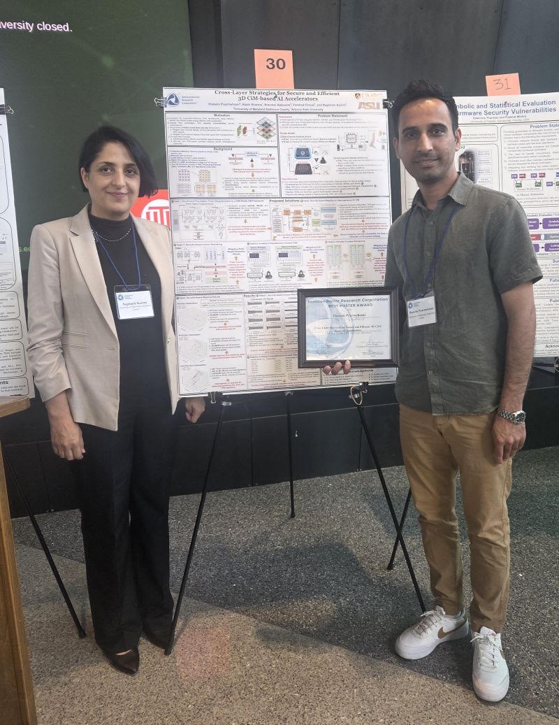 Houssein Pourmehrani stands with Dr. Naghmeh Karimi in front of his award winning poster