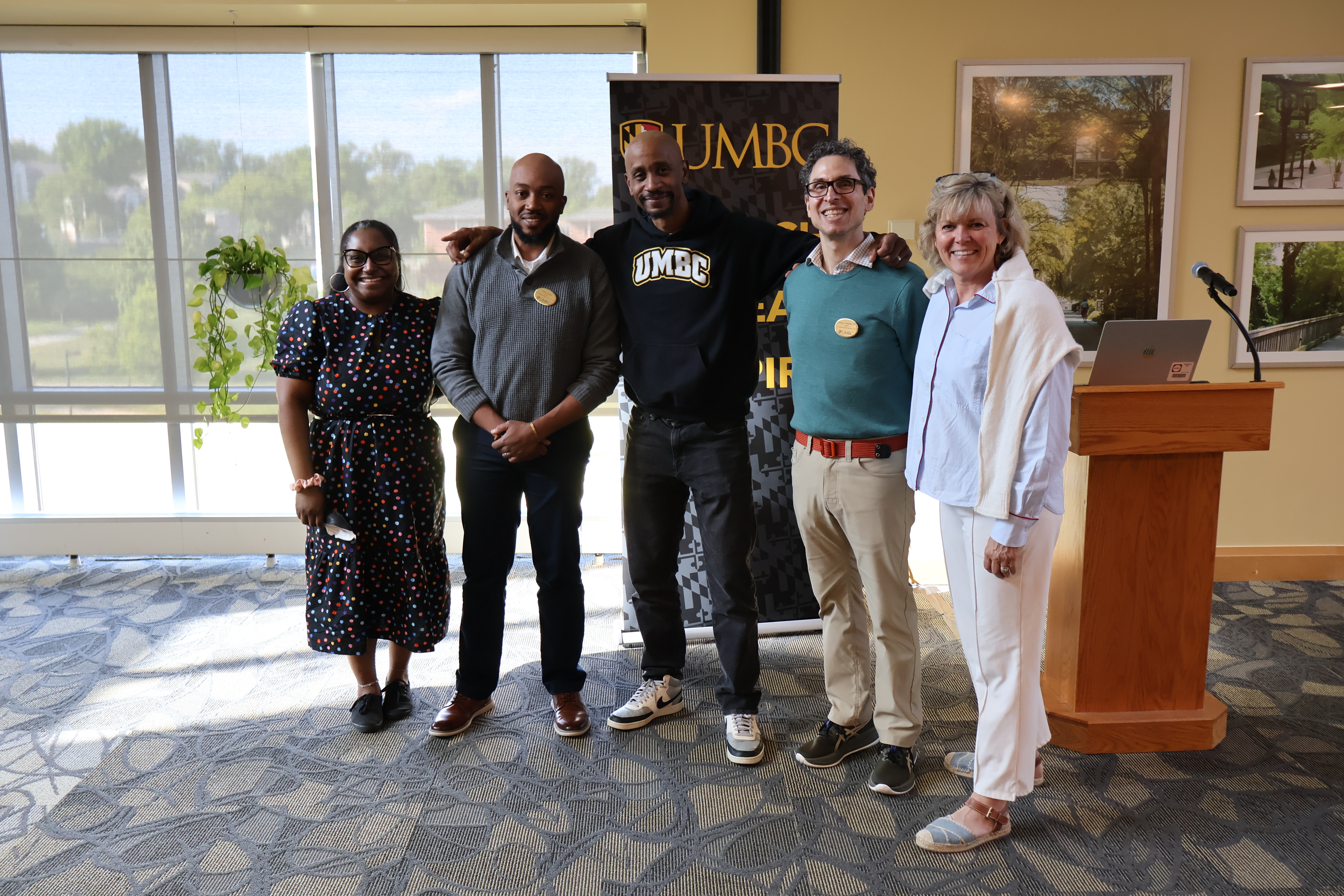 group photo of the staff of the george and betsy sherman center