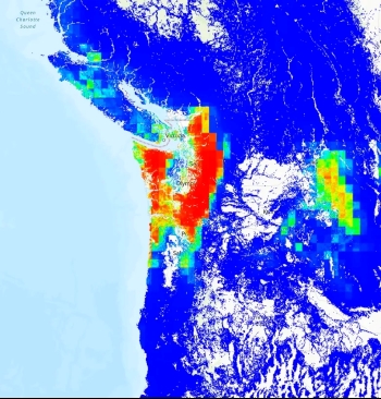 Image of western Washington State, Oregon, and northern California, light blue in left-third is the Sound and Pacific Ocean. Most of land area is royal blue (low landslide risk); in center of image, near Olympia, WA and points south, red indicates a higher landslide risk.
