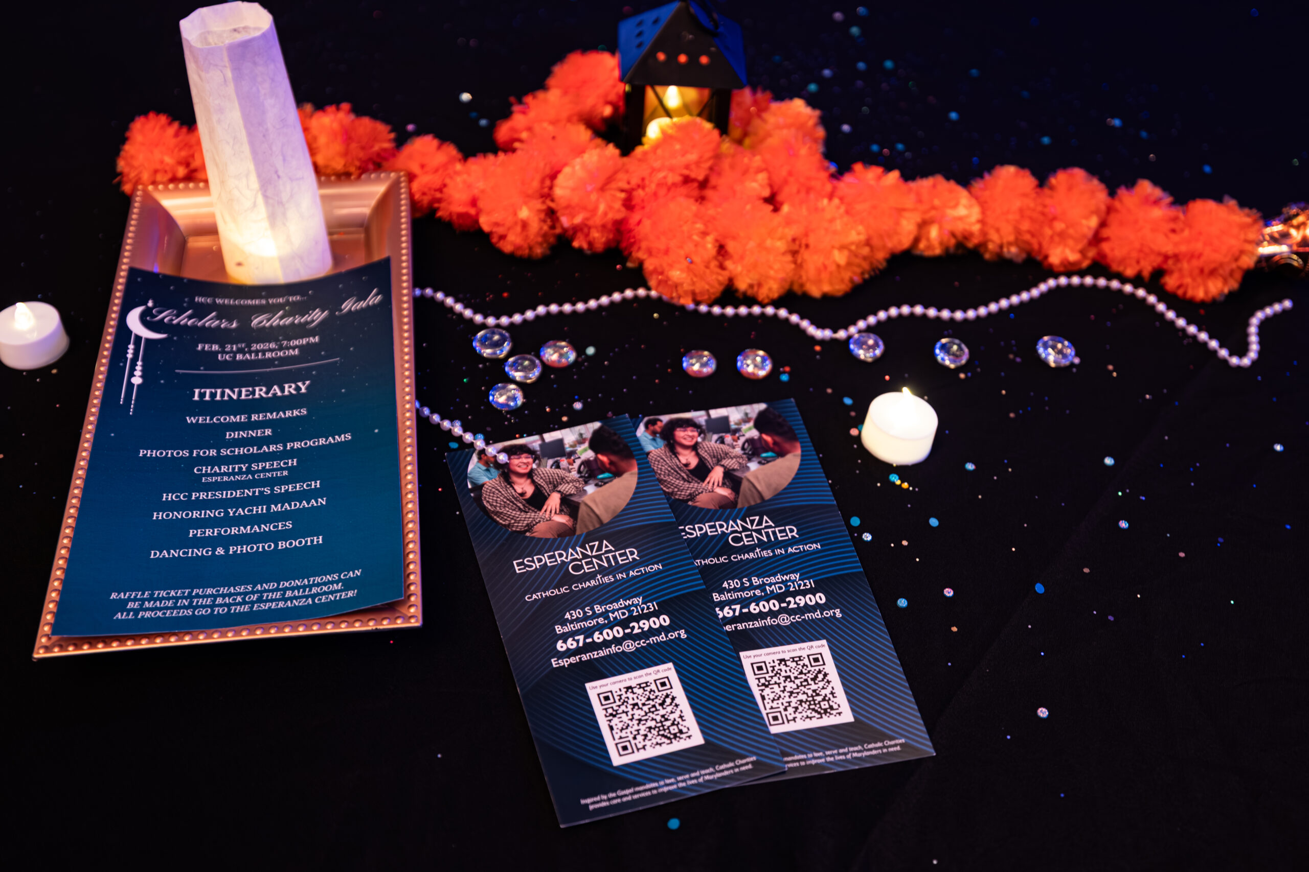 Event program and menu lying on a table with decorations.