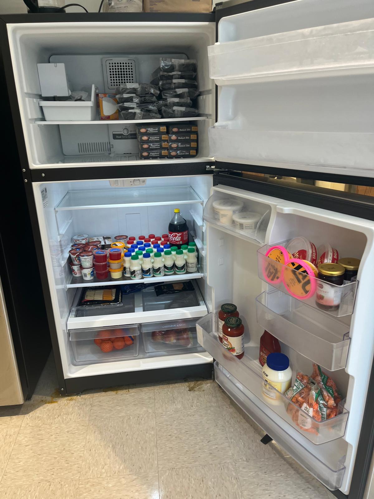 An image of the inside of the Passover fridge and freezer showing the selection of food and drinks inside
