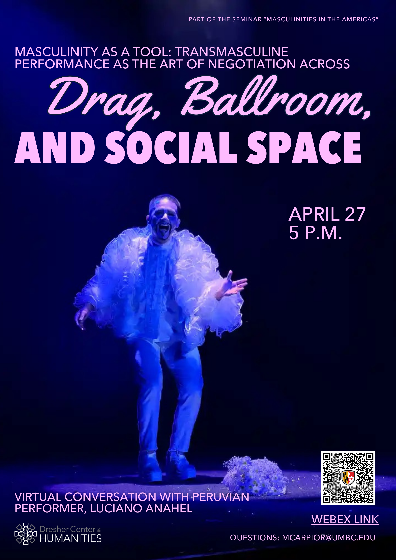 Luciano Anahel, a masculine presenting drag performer, is giving a performance on a stage with blue lighting.