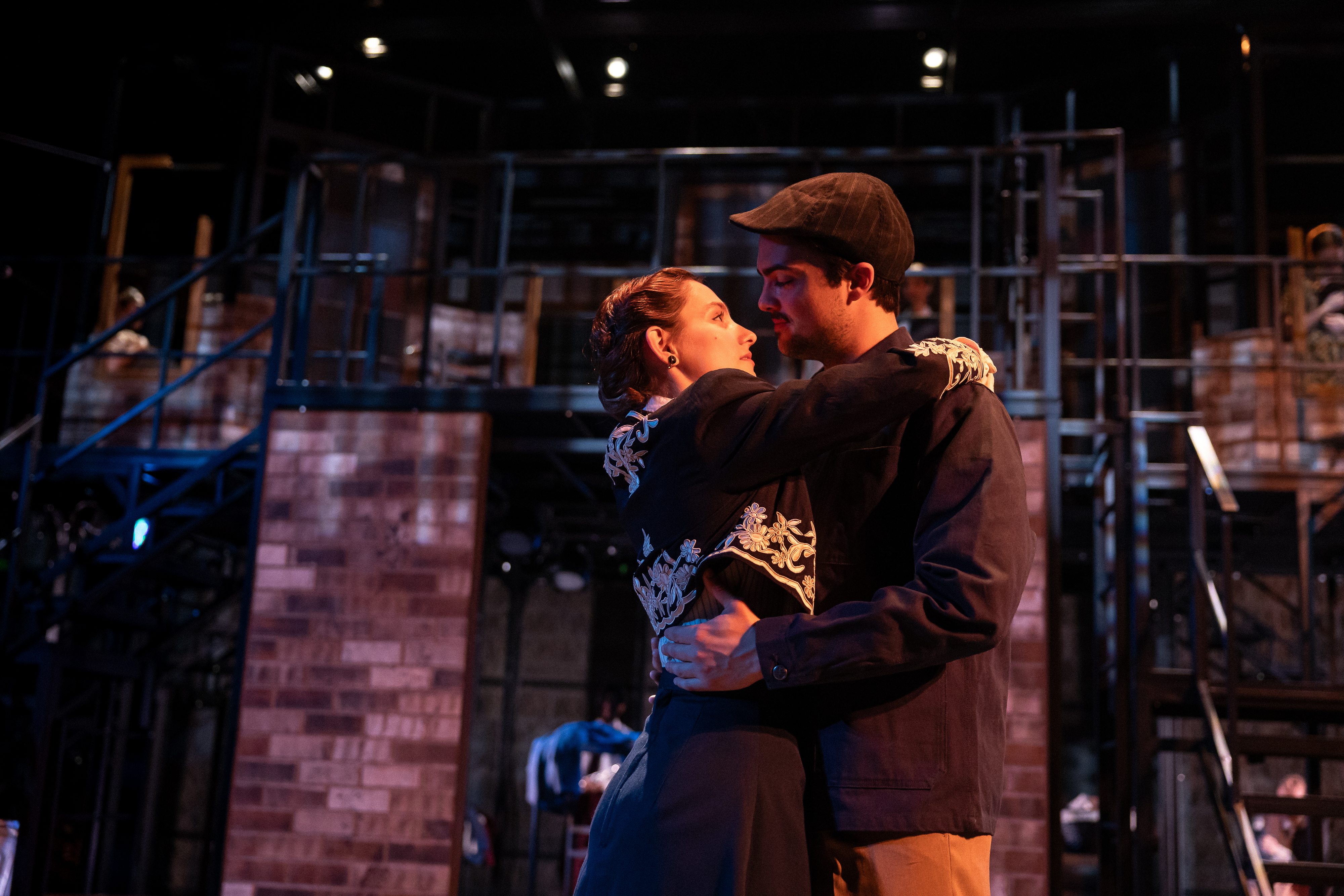 Production Photo from Street Scenes. The performers playing Kay and Sam Kaplan embrace.