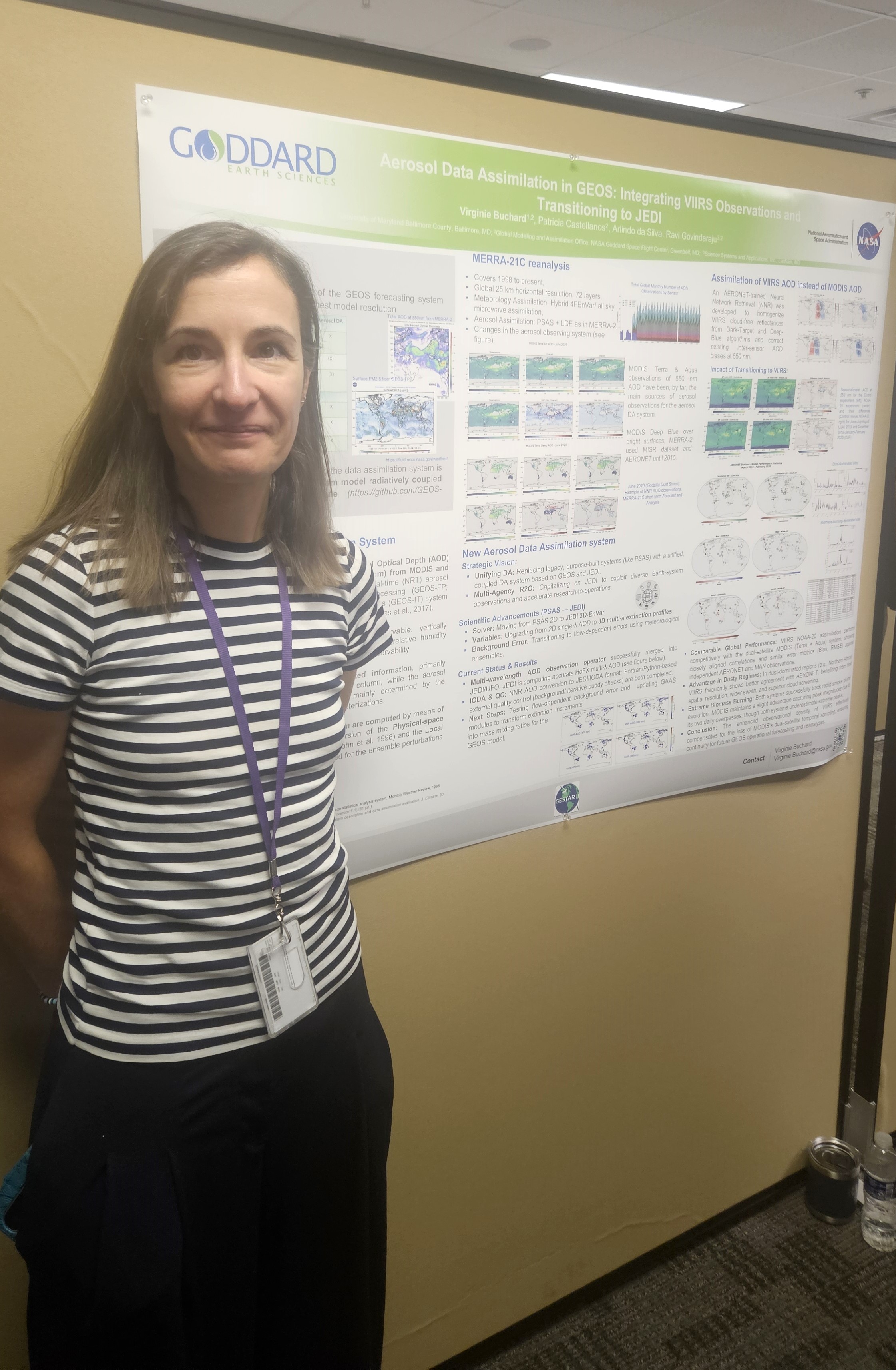 Dr. Virginie Buchard stands in front of her research poster "Aerosol Data Assimilation in GEOS: Integrating V-I-I-R-S Observations and Transitioning to J-E-D-I"