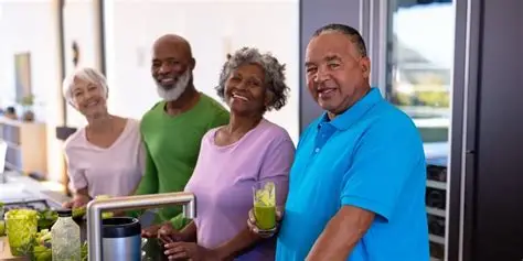 Picture of 2 older women and 2 older men enjoying healthy smoothies.
